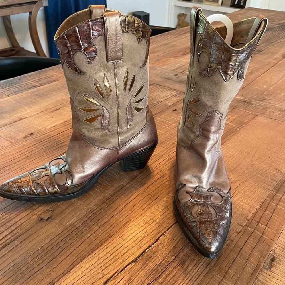 Van Eli gold sparkling cowgirl boots.